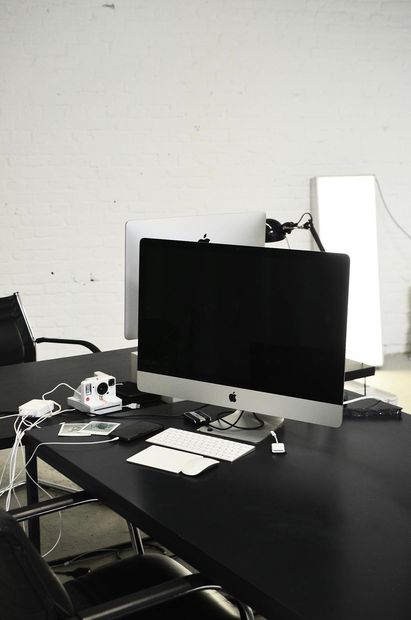 Modern convenient computer place on black table in office